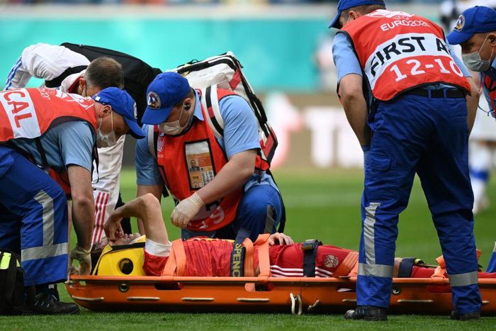 Fernandes had to be stretchered off in a neck brace after falling awkwardly