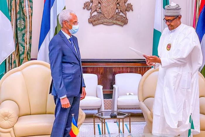 President Muhammadu Buhari (L) and Special Envoy from Republic of Chad, H.E. Mr Amine Abba Sidick. [Twitter/@NigeriaGov]