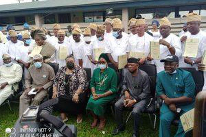 3rd in front seat, Retired Justice Ayotunde Phillips, Chairman, Lagos State Independent Electoral Commission (LASIEC) with chairmen-elect at LASEIC headquarters on Tuesday in Lagos. [NAN]