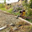 Man chops off railway in Enugu (Victor Chimela)