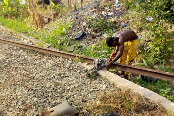 Man chops off railway in Enugu (Victor Chimela)