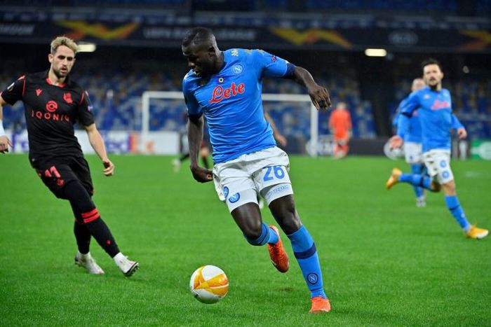 Napoli's Senegalese defender Kalidou Koulibaly (c) got the first goal after five minutes in Naples.