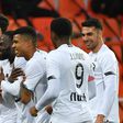 Jonathan Ikone (2ndL) celebrates with his teammates after scoring Lille's third goal in their win at Lorient on Sunday