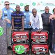 Globacom’s Regional Sales Manager, Enugu, Mike Ehumadu (6th right); Director of Marketing Communications, Andre Beyers (4th left), Assistant Director and Zonal Coordinator of National Lottery Regulatory Commission, Oliver Madukwe (4th right); Chairman ...
