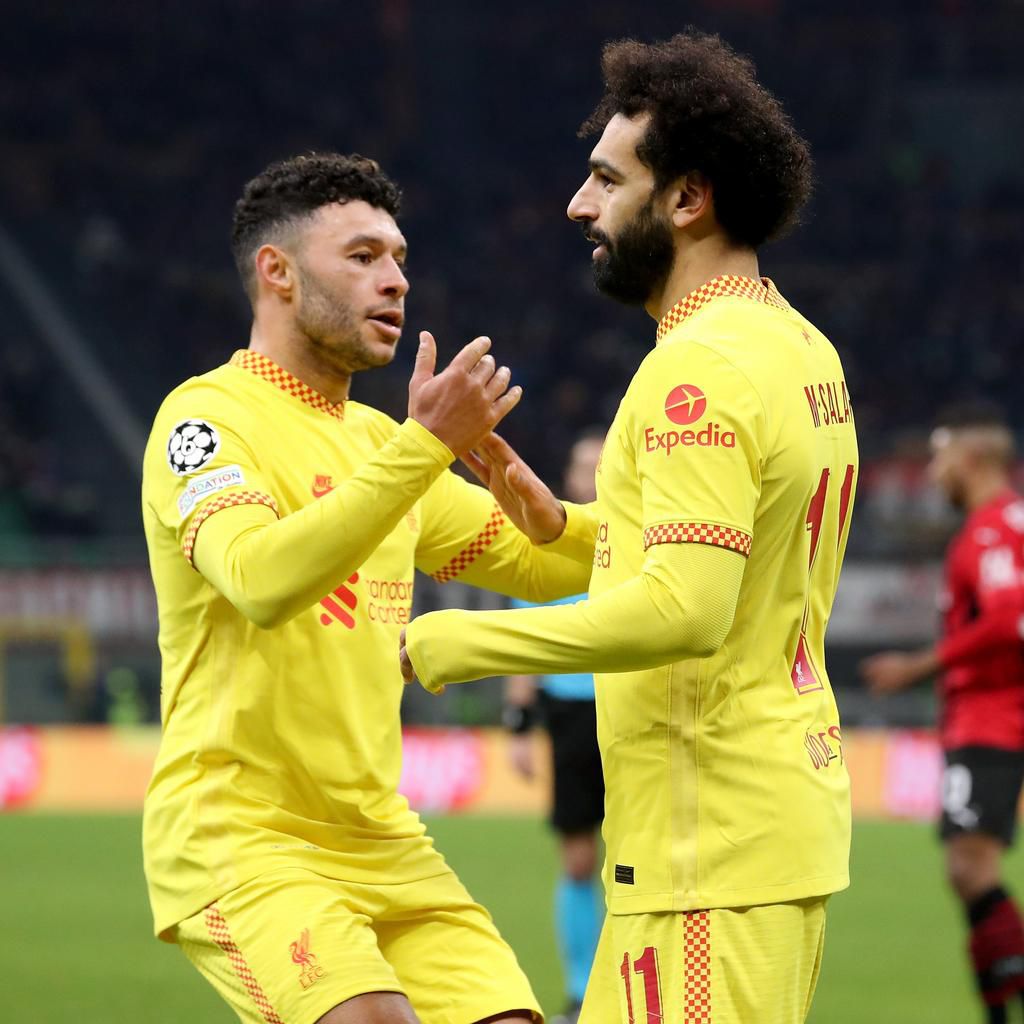 Oxlade Chamberlain congratulates Salah for another milestone.