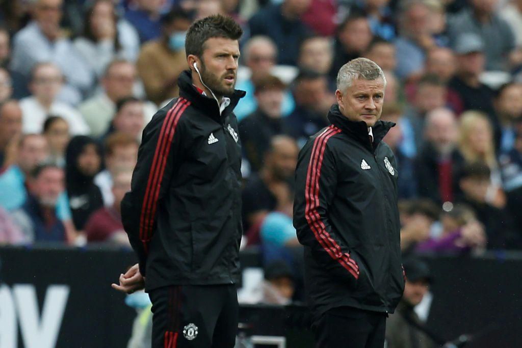Michael Carrick (left) will take caretaker charge of Manchester United following the sacking of Ole Gunnar Solskjaer