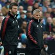 Michael Carrick (left) will take caretaker charge of Manchester United following the sacking of Ole Gunnar Solskjaer