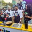 Gov. Babajide Sanwo-Olu of Lagos State, preparing fried seafood rice with celebrity chef, Diary of a Kitchen Lover and Big Brother Nigeria winner, Whitemoney, during the 2021 Lagos Food Fest on Sunday at Muri Okunola park, Lagos. (NAN PHOTO)