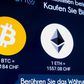 The exchange rates and logos of bitcoin, ether, litecoin, and monero are seen on the display of a cryptocurrency ATM of blockchain payment service provider Bity at the House of Satochi bitcoin and blockchain shop in Zurich, Switzerland, March 4, 2021.