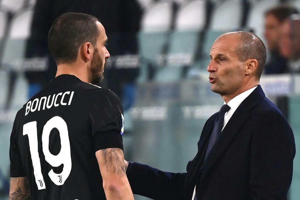 Defensive issues: Juventus coach Massimiliano Allegri talks to one of his veteran centre backs Leonardo Bonucci during the loss at Sassuolo