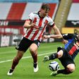 Sheffield United midfielder John Fleck has tested positive for coronavirus and is to self-isolate at Scotland's pre-Euro 2020 training camp in Spain the Scottish Football Association announced
