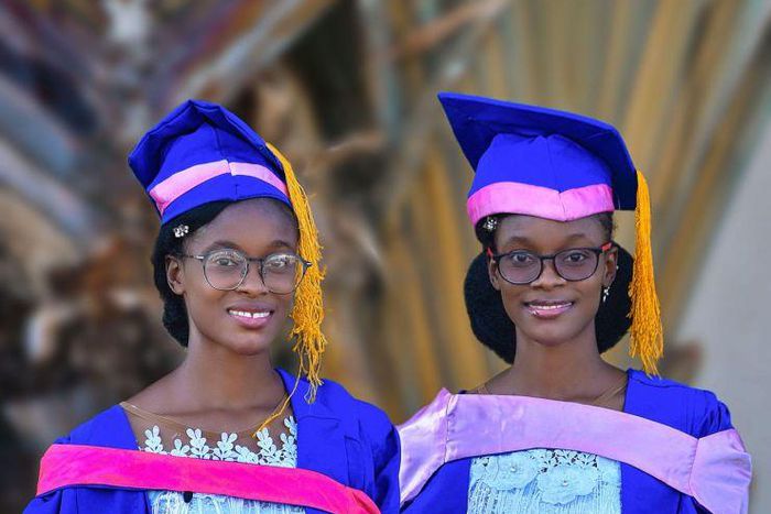 Adorable twins bag first-class degrees from the same university