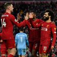 22 reasons to cheer: Mohamed Salah (2nd right) and Jordan Henderson (left) scored in Liverpool's victory over Southampton