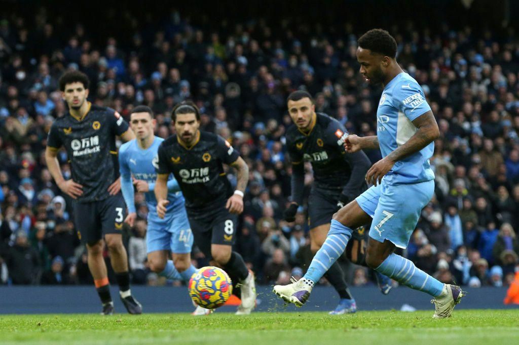 Manchester City's Raheem Sterling scores against Wolves