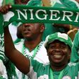Nigeria fans cheer during the 2018 FIFA World Cup qualifying football match between Nigeria and Cameroon at Godswill Akpabio International Stadium in Uyo, Nigeria, on September 1, 2017