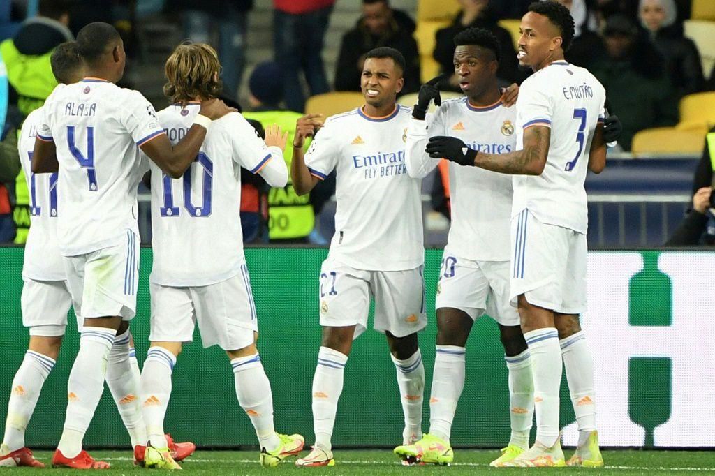 Vinicius Junior (second from the right) was congratulated by his Real Madrid teammates after scoring twice