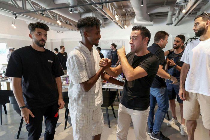 Xavi (third right) saying goodbye to his Al Sadd players on Frday