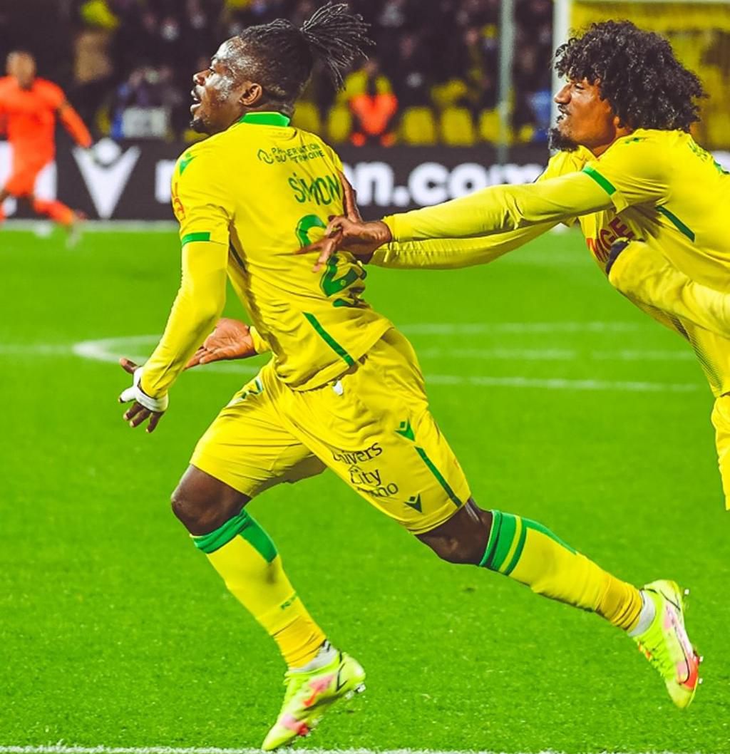 MATCH WINNER! Moses Simon wheels away in celebration after his goal for Nantes against Lens.