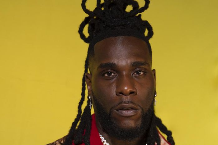 Burna Boy's hair is groomed by Mata Marielle