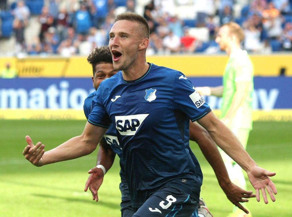 Hoffenheim's Czech defender Pavel Kaderabek celebrates scoring their third goal against Wolfsburg