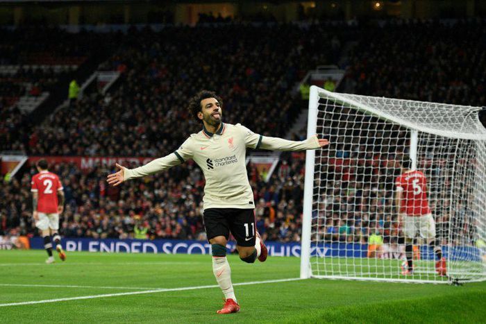 Mohamed Salah celebrates after scoring Liverpool's fifth goal, and his third, at Old Trafford