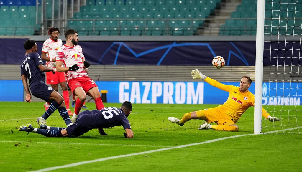 Riyad Mahrez scores for Manchester City against RB Leipzig