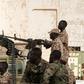 Paramilitaries of the Rapid Support Forces, in their trademark pickup trucks mounted with anti-aircraft or heavy machine guns, have deployed outside key buildings in cities across Sudan