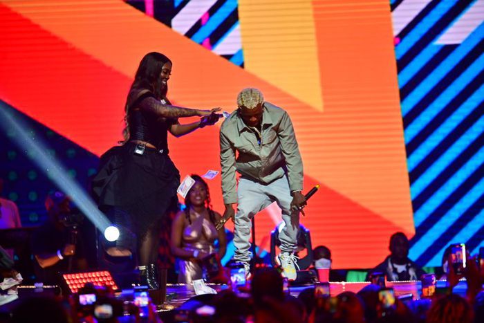 Tiwa Savage spraying Portable