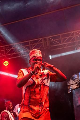 Ace comedian Kenny Blaq thrilling the crowd with premium comedy at the Ofada Rice Day Festival 2021