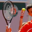 Serbia's Novak Djokovic reacts after missing a shot against Austria's Dominic Thiem in their semifinal match of the French Open tennis tournament at the Roland Garros stadium in Paris, Saturday, June 8, 2019. (AP Photo/Michel Euler)