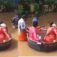 Bride & groom float in a cooking pot to wedding as flooding kills 27 people (video)