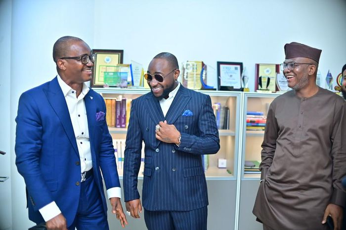 L-R: Managing Director/CEO, Wema Bank, Ademola Adebise; Nigerian Music Superstar and ALAT's new brand ambassador, David 'Davido' Adeleke; and Executive Director, Corporate and West, Wema Bank, Wole Akinleye, at the official unveiling of ALAT's new bran...