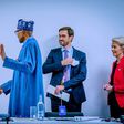 President Muhammadu Buhari shakes President Emmanuel Macron [Presidency]
