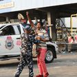 Police Task Force arresting a peaceful protester at the Lekki Toll Gate Plaza