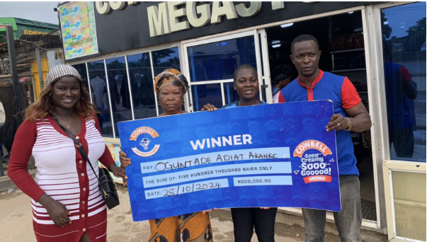 Presentation of ₦500,000 cash prize to a lucky Winner, Oguntade Idiat at the redemption Centre in Lagos State