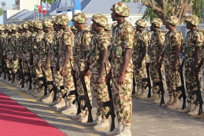 Troops from operation Hadin Kai Maimalari line up at the Aiir Force Base in Maiduguri on December 11, 2023 during Nigerian President Bola Tinubu visit to the start of the Chief of Army Staff's (COAS) Annual Conference 2023. [Getty Images]