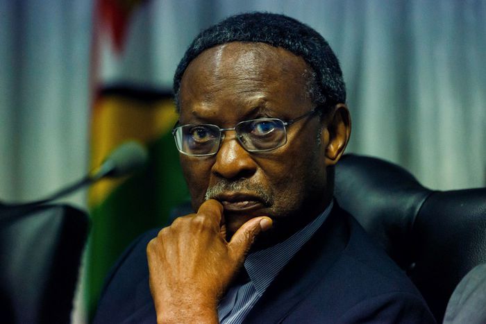 Chief Emeka Anyaoku listens to Zimbabwe's opposition party Movement for Democratic Change Alliance (MDC) leader Nelson Chamisa addressing the Commission investigating the post-election violence of the August 1 in Zimbabwe, in Harare on November 26, 201...