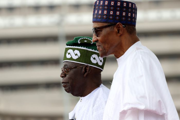 Nigeria President-elect Bola Ahmed Tinubu (L) arrives to attend swearing-in ceremony at Eagle Square venue in the capital, Abuja, Nigeria on May 29, 2023. Former President Muhammadu Buhari (R) also present at the ceremony.  [Getty Images]