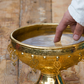 Temple goers drink AC water, believing it is sacred