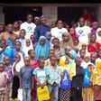 Some members of Ibironke Adeagbo Foundation with some children