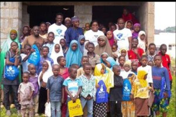 Some members of Ibironke Adeagbo Foundation with some children