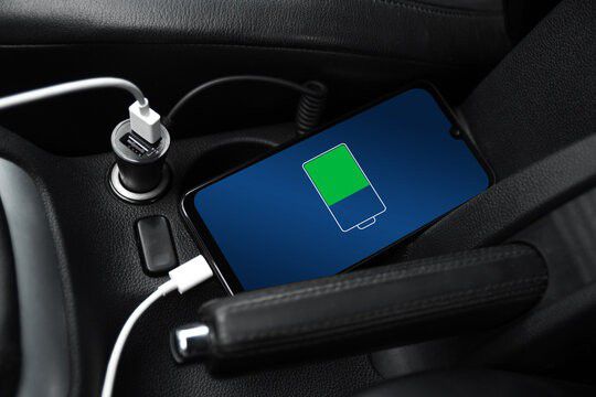 Should you charge your phone with a car charger [adobestock]