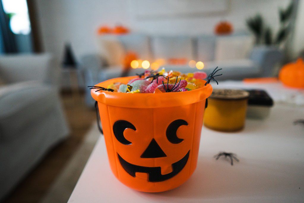 The author says that her kids already have too much stuff and so she avoids giving them a basket full of toys on Halloween.FluxFactory/Getty Images