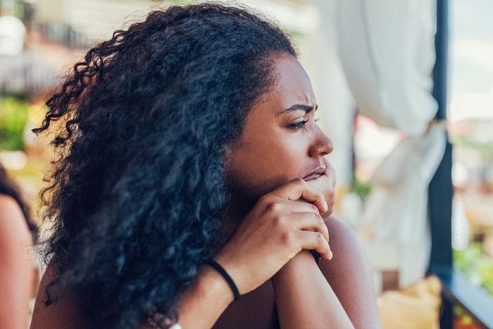 Black woman thinking (Zora)