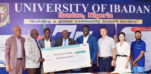 University of Ibadan's Vice-Chancellor with some academic staff and representatives from OPay