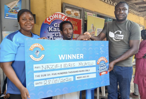 Presentation of ₦500,000 cash prize to a lucky Winner, Nazifi Idris at the redemption Centre in Kano State