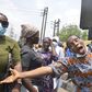 A woman react during a disgruntled faction of older women and Inspired group march with a banner during a walk demanding better government due to the recent hike in insecurity, hunger and inequality. [Getty Images]