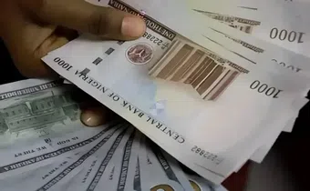 Naira gains N28.85 against dollar at official market