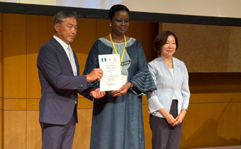 Mrs Florence Akinyemi Adeseke, Nigeria’s charge d’affaires and Yoshikuni Watanabe, the Mayor of Kisarazu with the certificate that designates Kisarazu Nigeria’s hometown. Credit: State House
