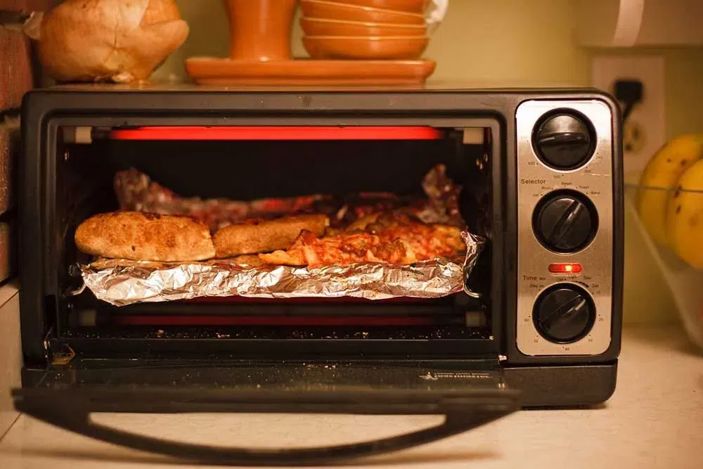The oven is the best way to reheat pizza [Shouldit]